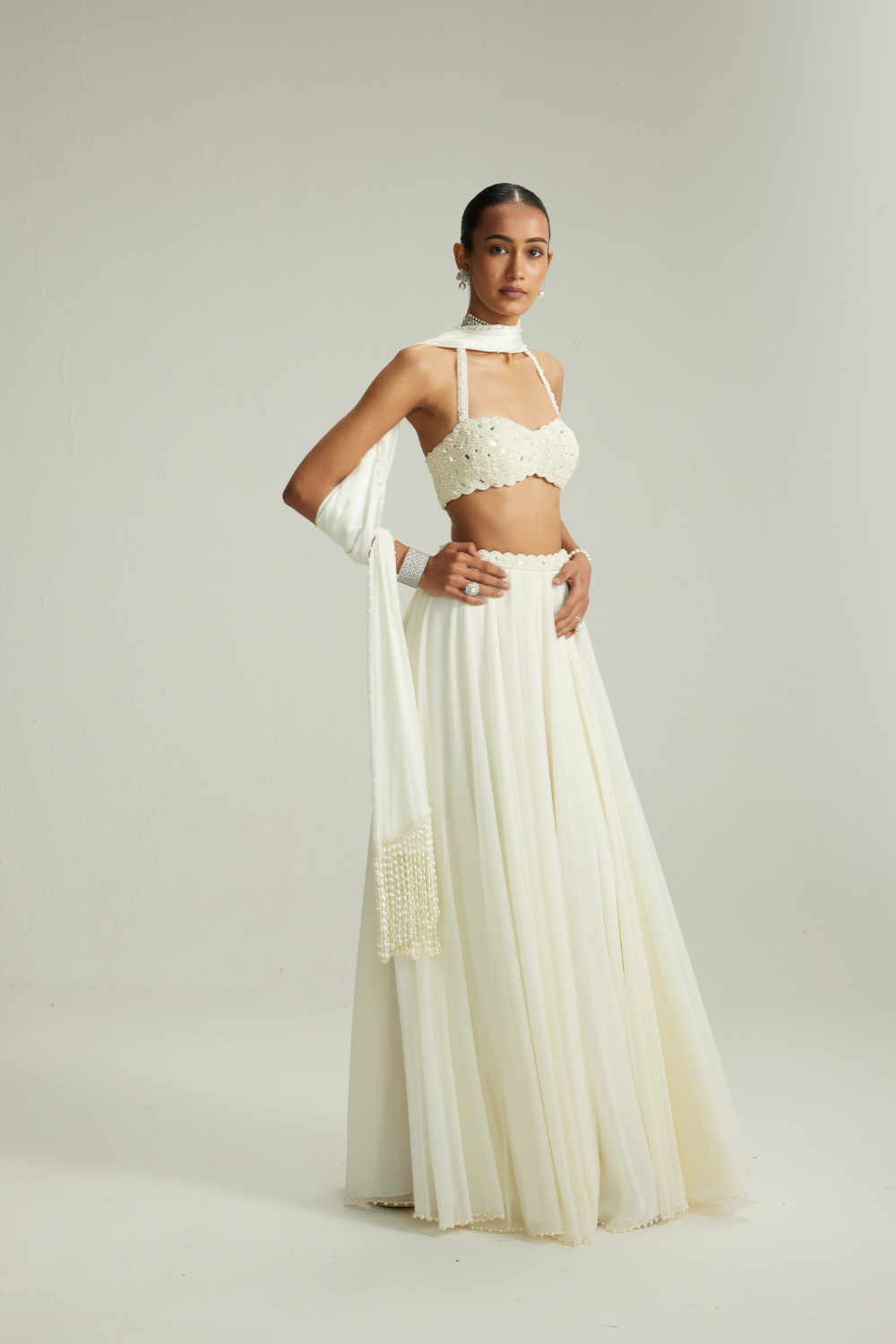 Off White Skirt Set With Halter Neck Blouse