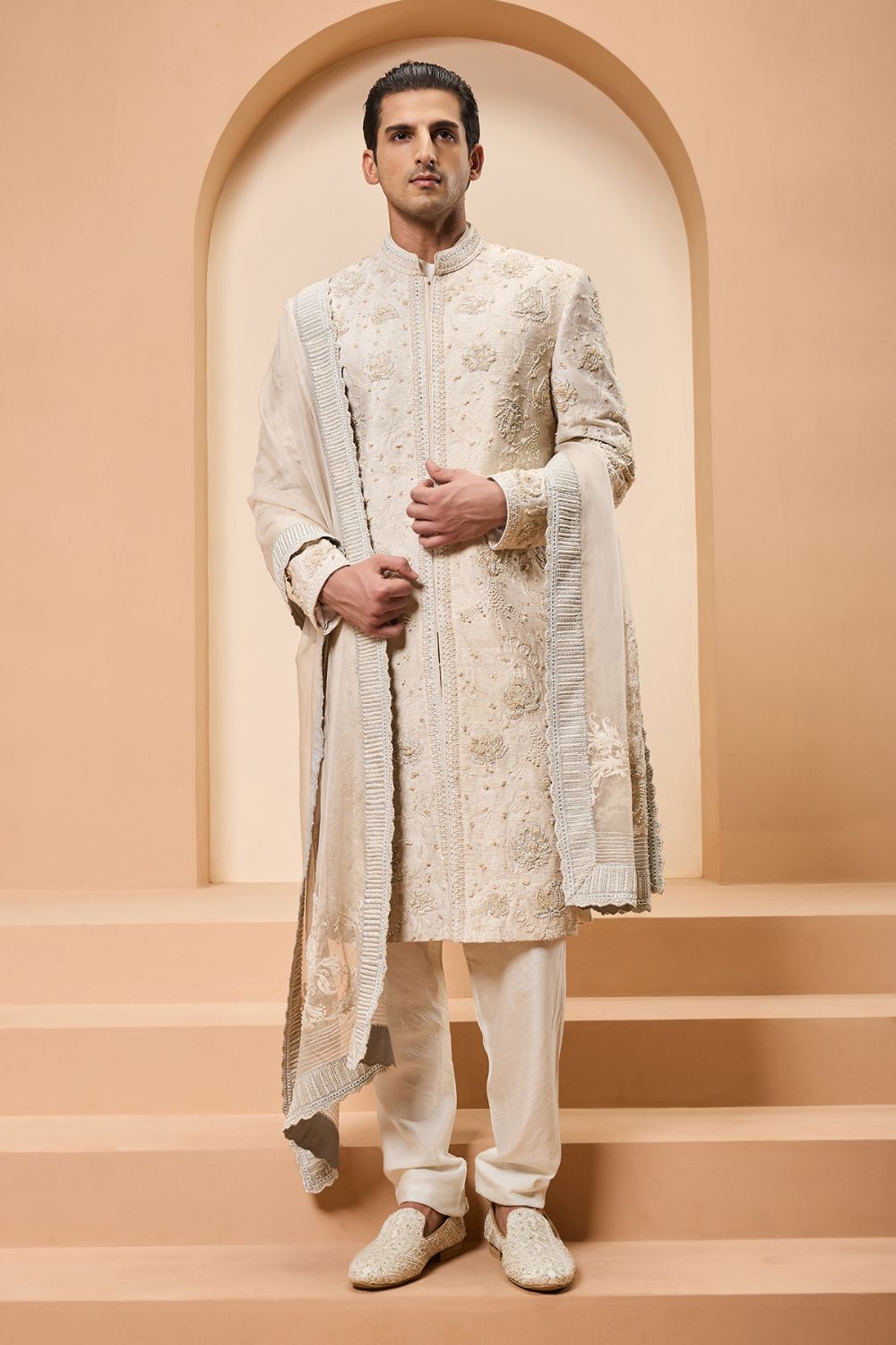 Ivory sherwani detailing with pearl,sequins and thread work