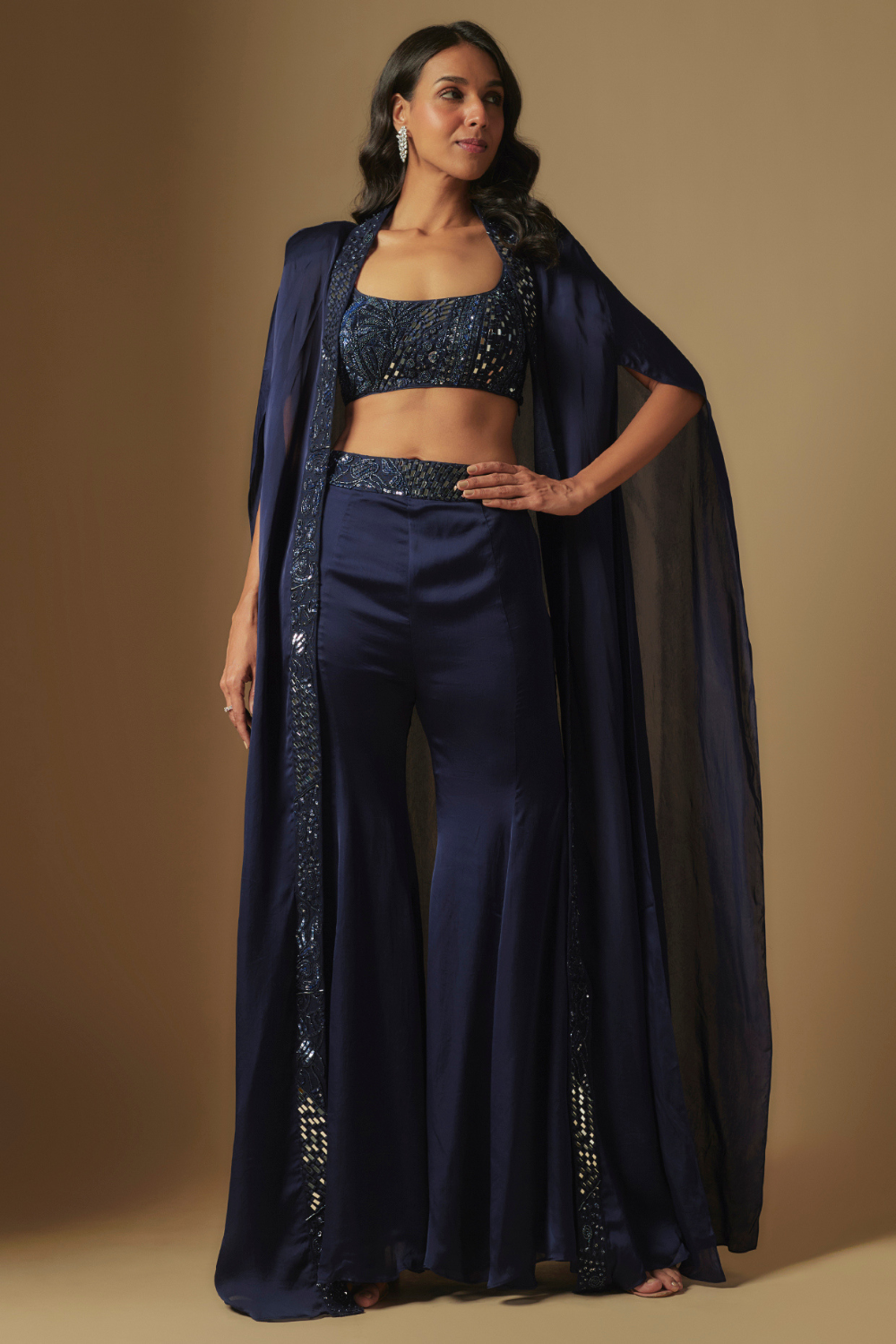 Ibex Hand embroidered blouse paired with sharara and embroidered cape