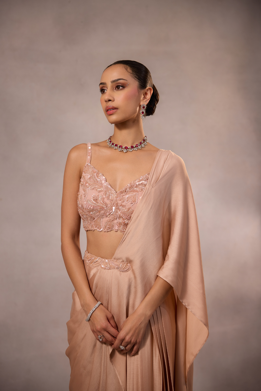 Champagne Pink Draped Saree Set with Embellished Bustier Blouse