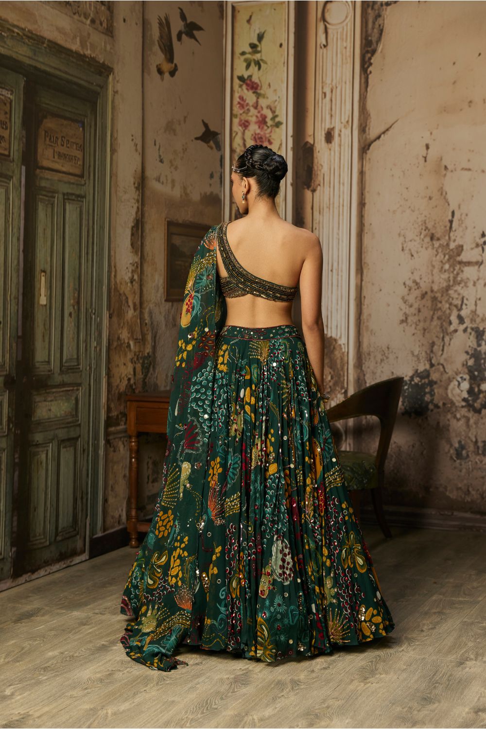 DARK GREEN EMBELLISHED BOUSE WITH PRINTED AND HIGHLIGHTED LEHENGA SET