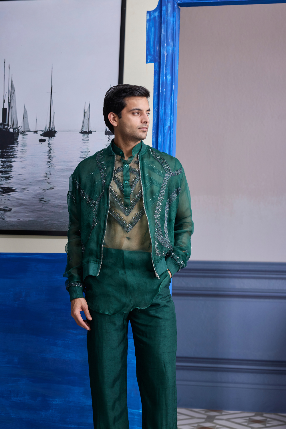 Dark Green Organza Kurta with Embroidered Organza Bomber Jacket Paired with Solid Pants