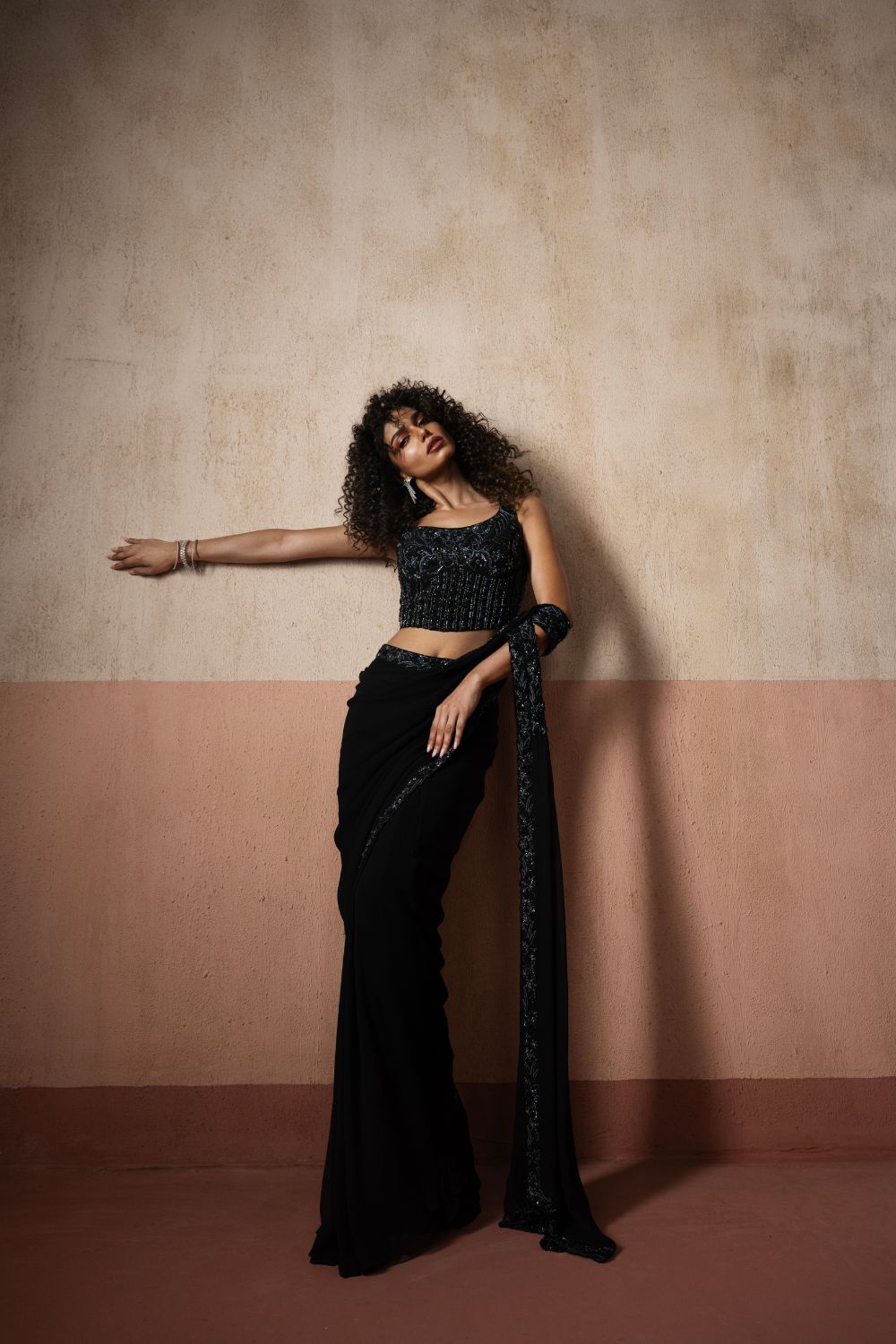 Predraped , black hand embroidered georgette saree