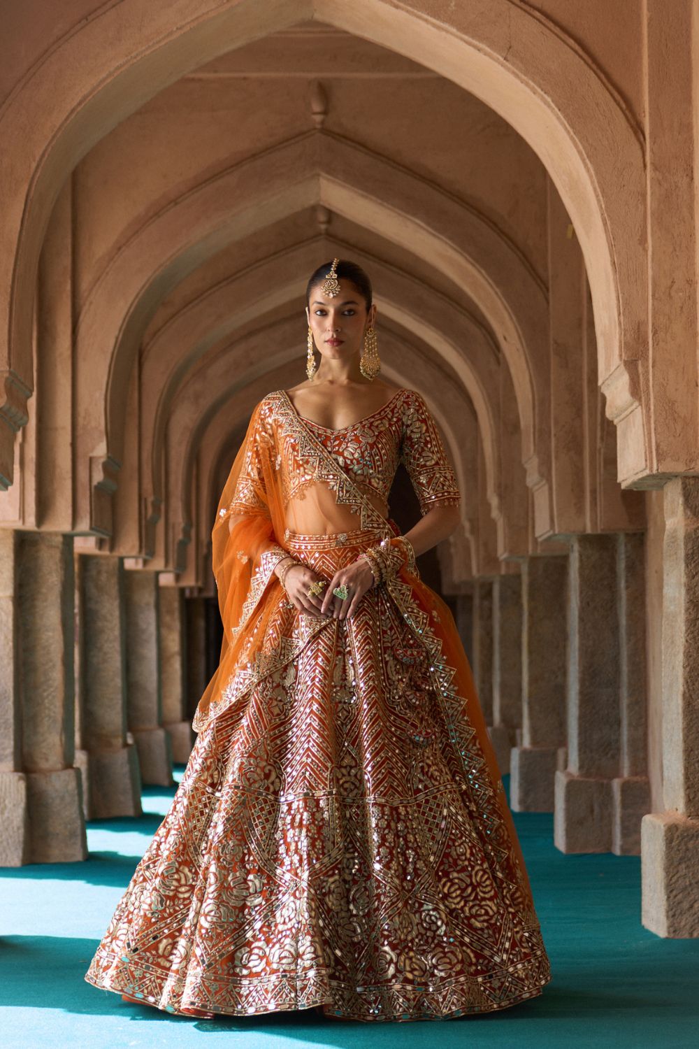 TEJ — Rust Orange Organza Lehenga Set