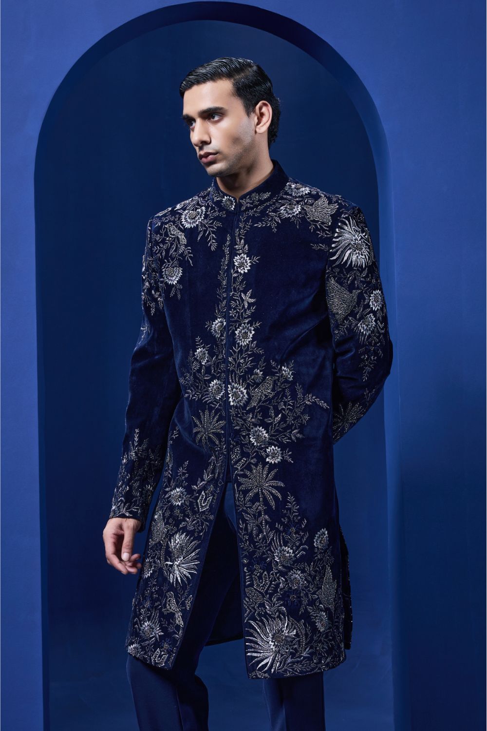 Navy blue Indo Western highlighted with silver zari, pearl and cutdana