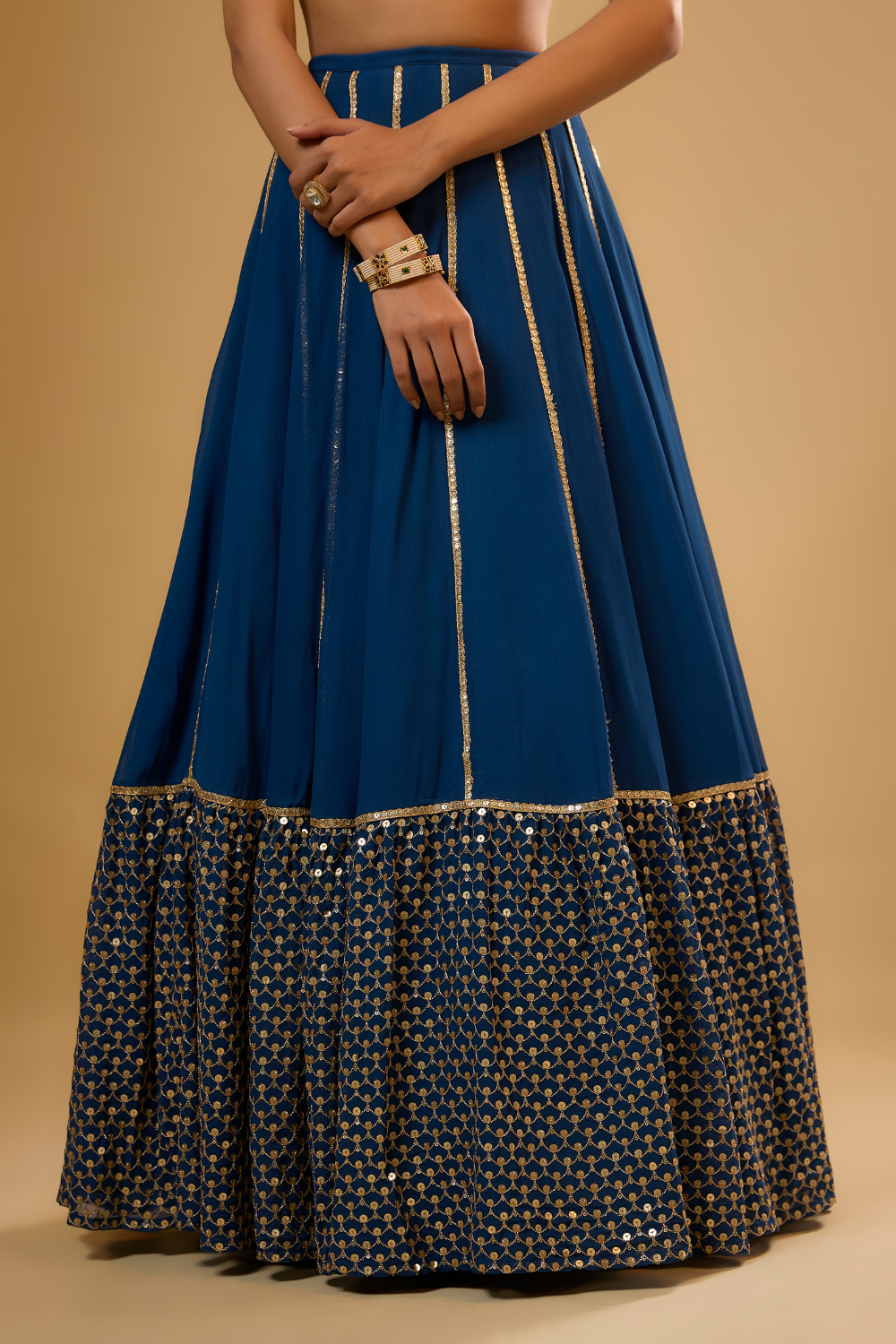 Egyptian blue georgette lehenga set embroidered with mirrors and gold sequins