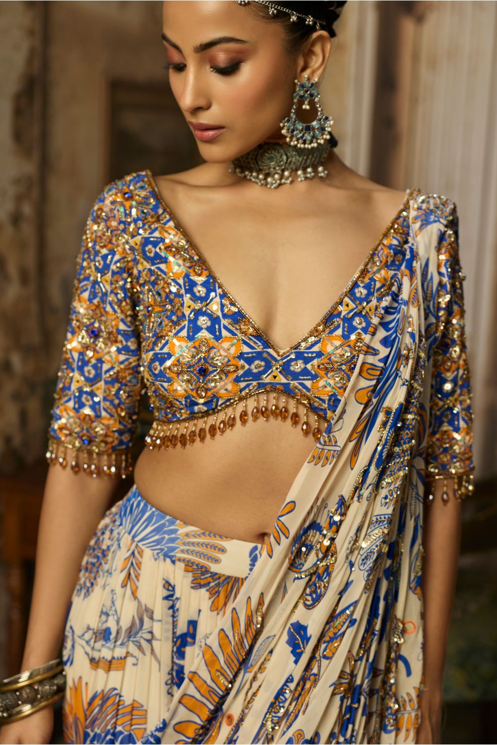 IVORY PRINTED AND HIGHLIGHTED TIERED SKIRT SAREE SET