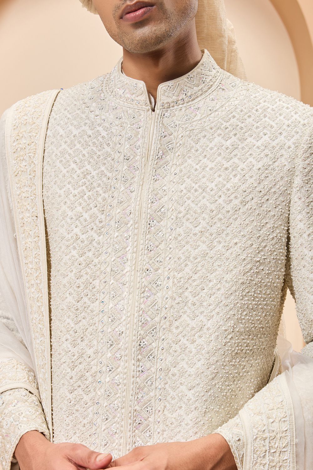 Ivory sherwani detailing with pearl, rainbow sequins and thread work