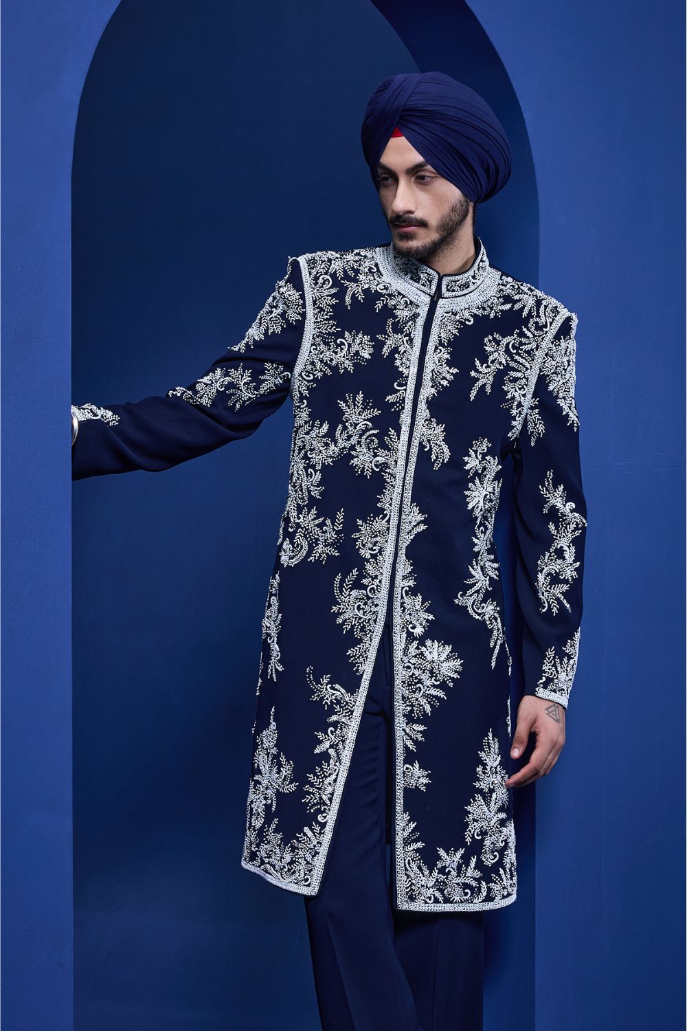 Navy blue Indo Western highlighted with sequins, pearls, cutdana and spring thread work