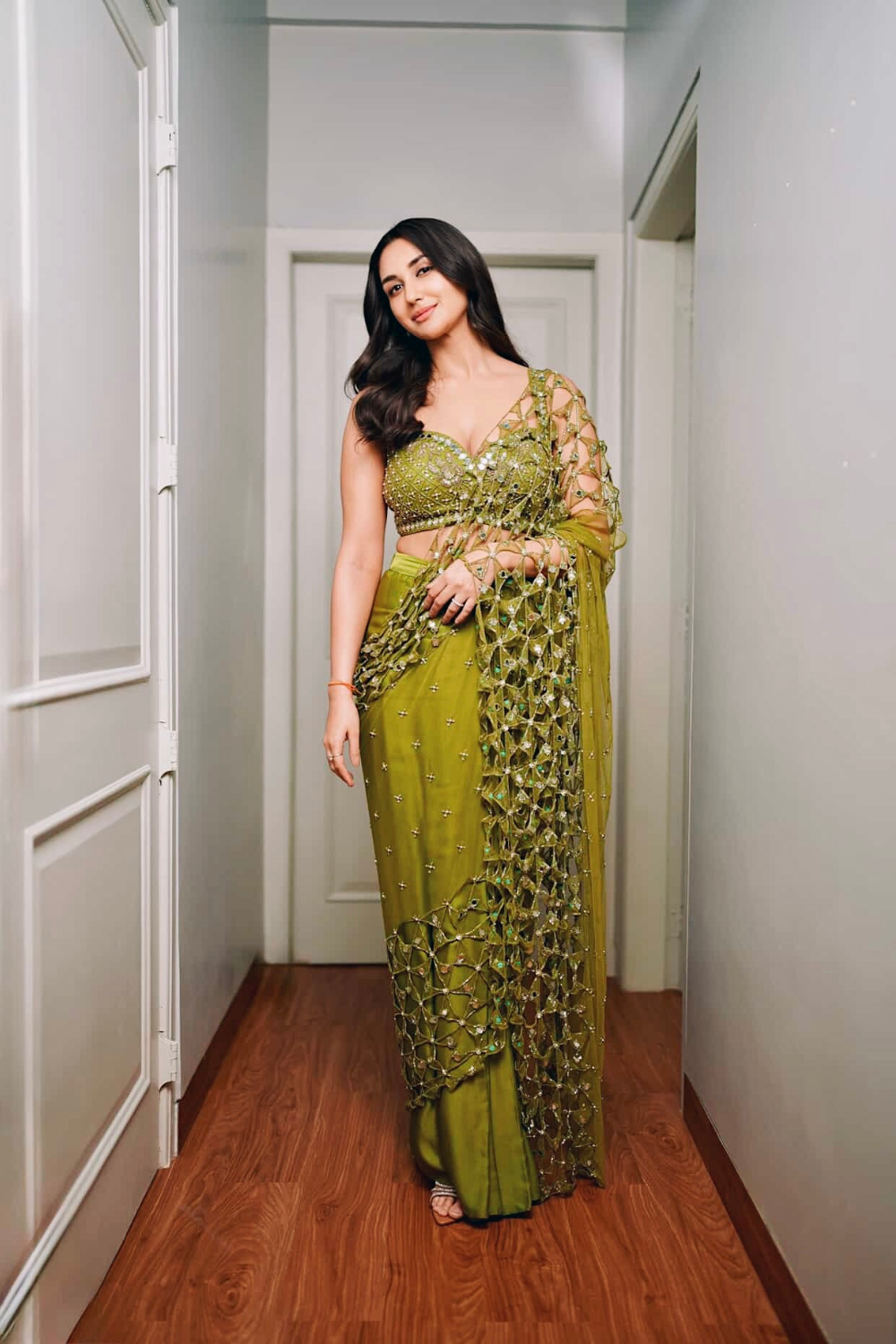 Predraped , mehendi green , hand embroidered net & satin saree