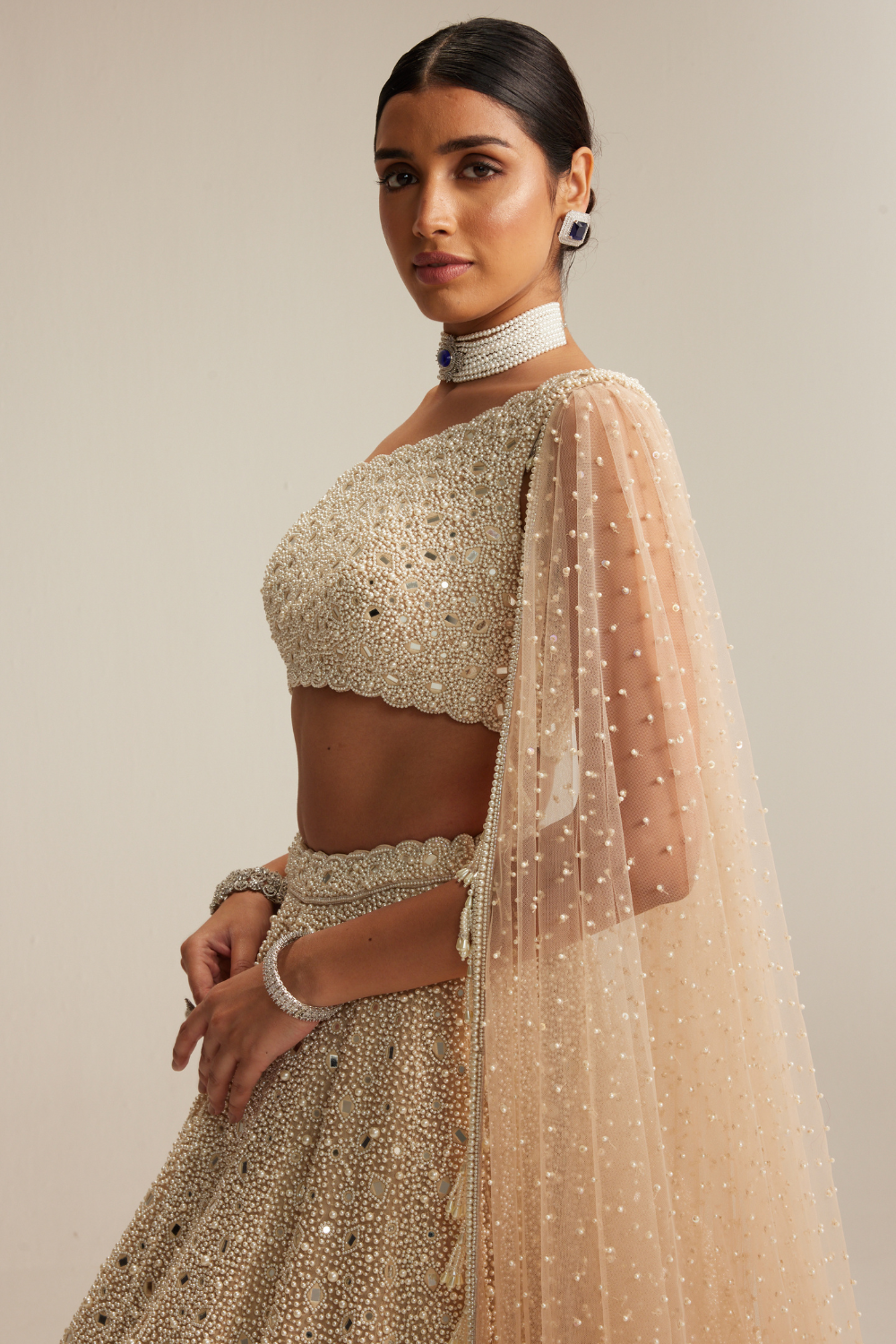 Light Beige Dense mirror and pearl one shoulder lehenga set