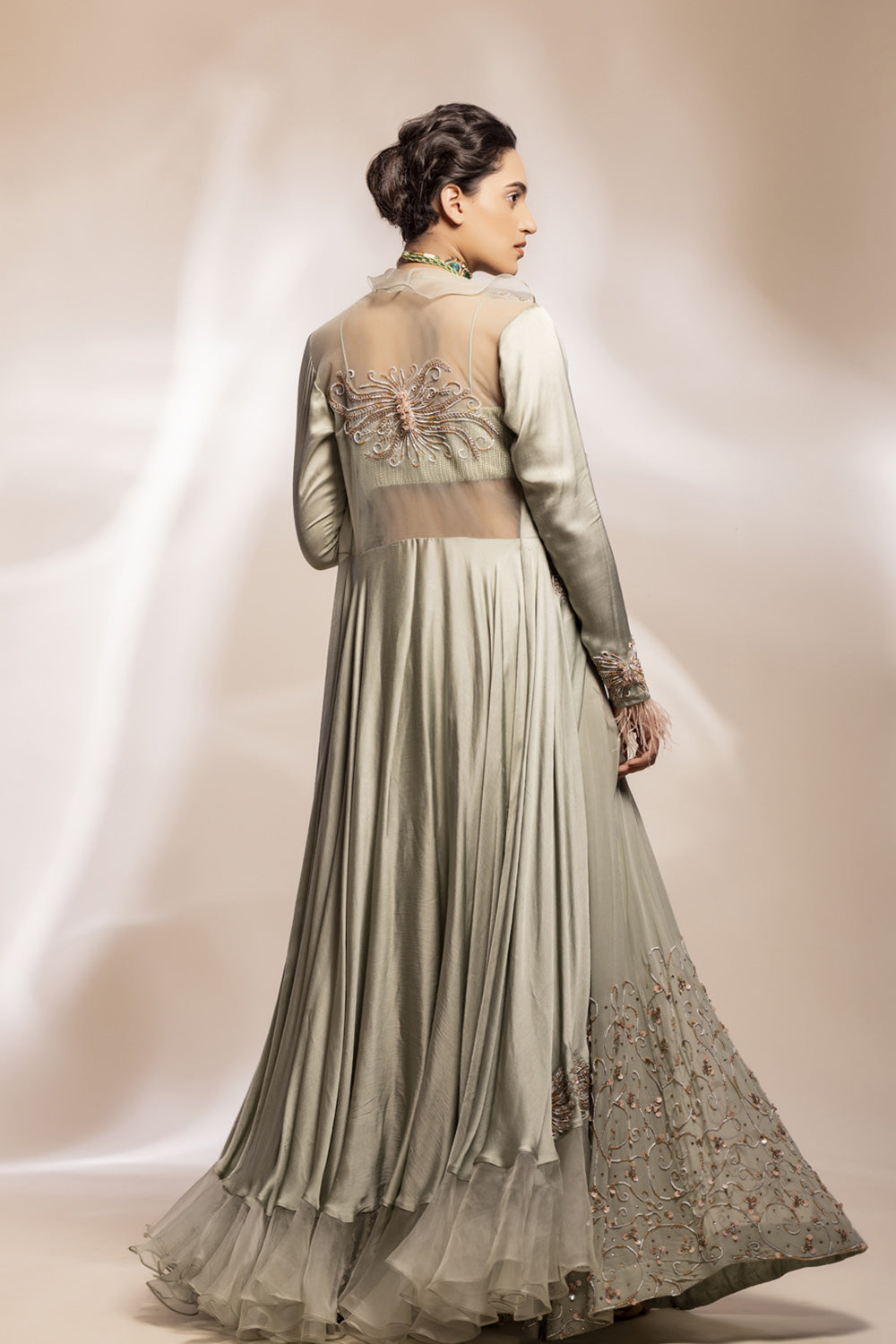 Long assymetrical jacket, inner corset and sharara