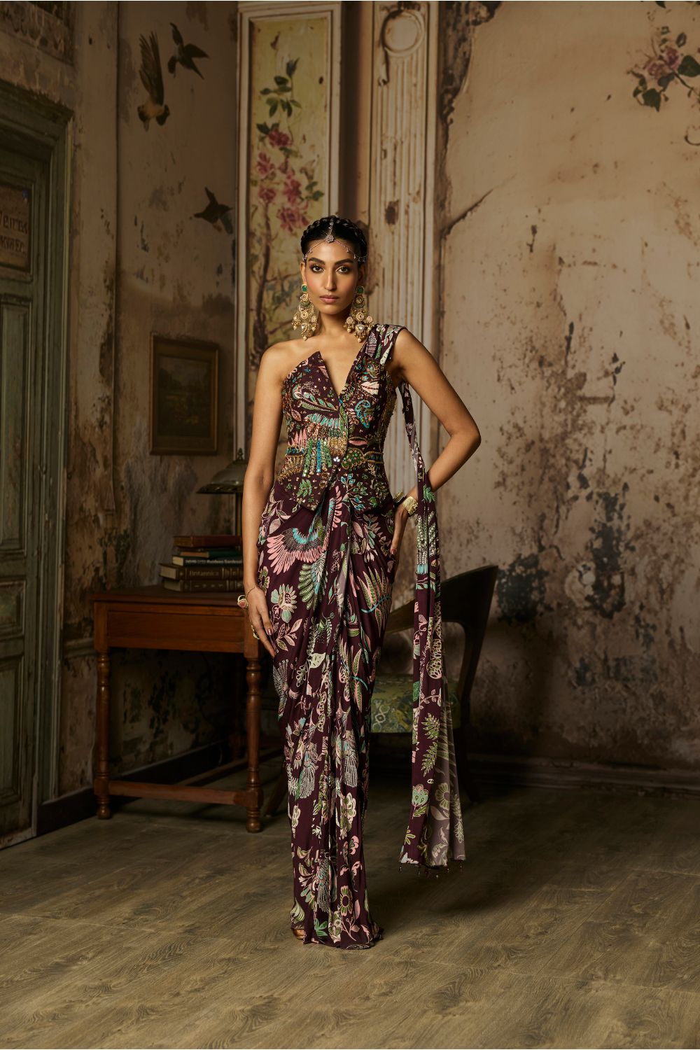PLUM PRINTED AND HIGHLIGHTED CORSET WITH DHOTI SKIRT SAREE SET