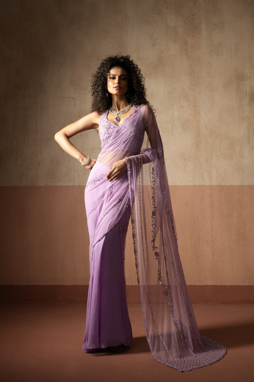 Predraped , lavender, hand embroidered net & georgette saree