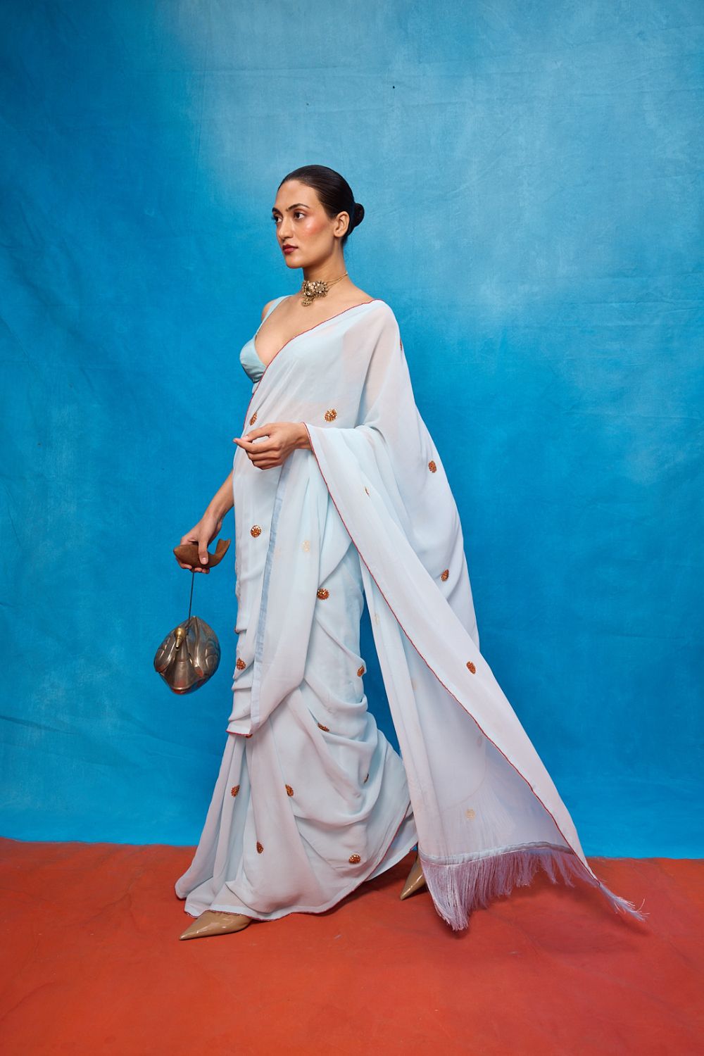 Handwoven Ice Blue Georgette Embroidered Saree