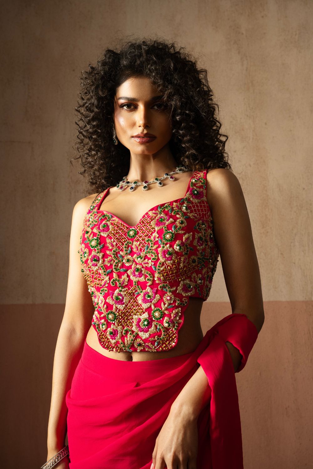 Predraped , fuschia pink , embroidered georgette saree with corset blouse