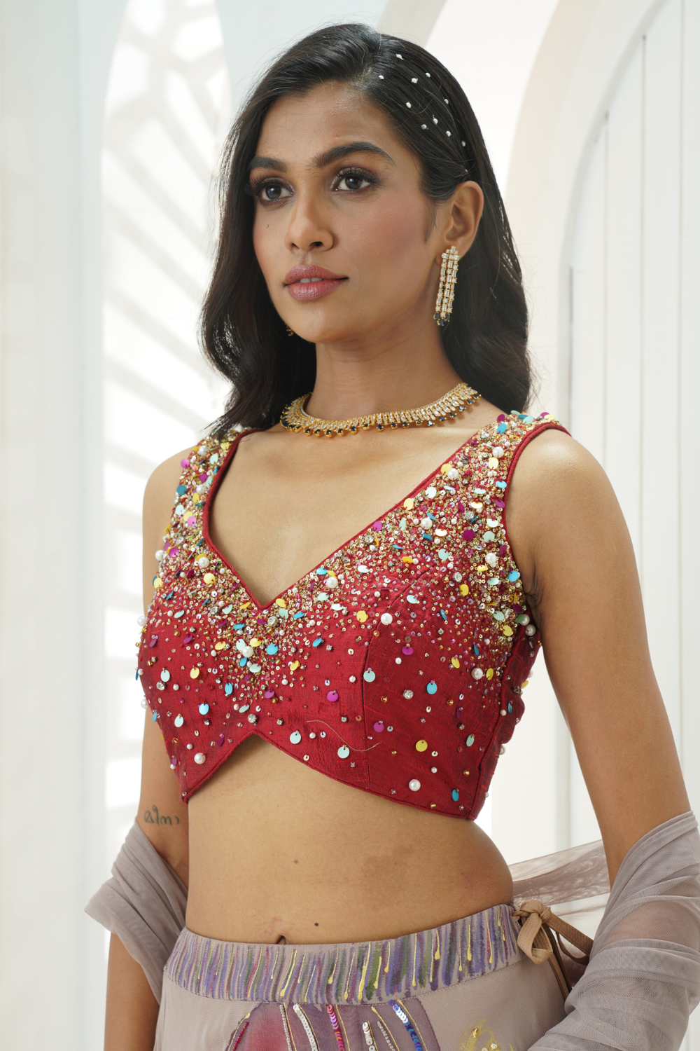 Mauve hand painted lehenga and embroidered Red blouse set