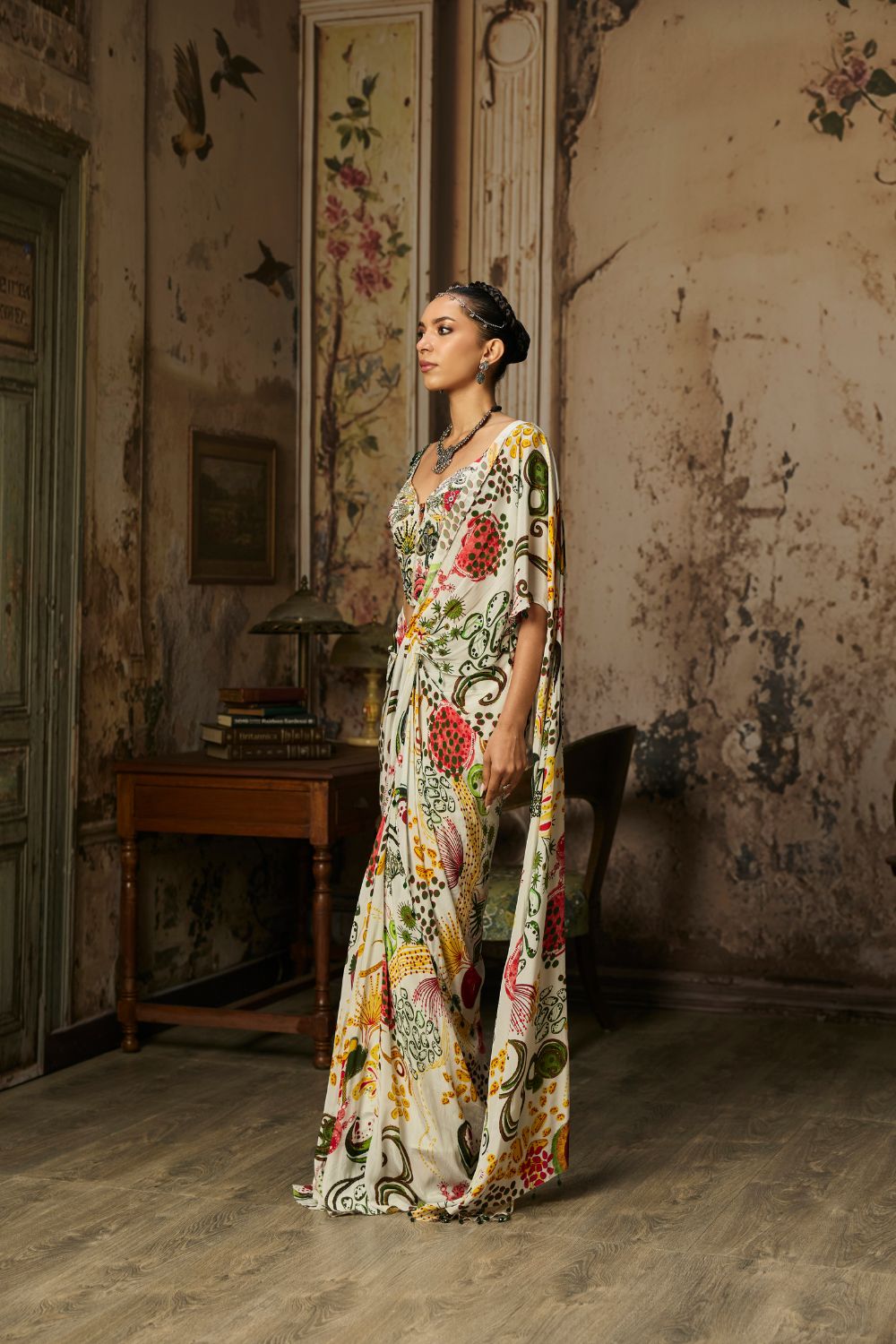 IVORY PRINT AND HIGHLIGHTED CORSET WITH DHOTI SKIRT SAREE SET