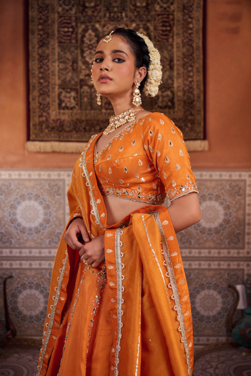 Rust orange silk embroidered blouse, lehenga and dupatta