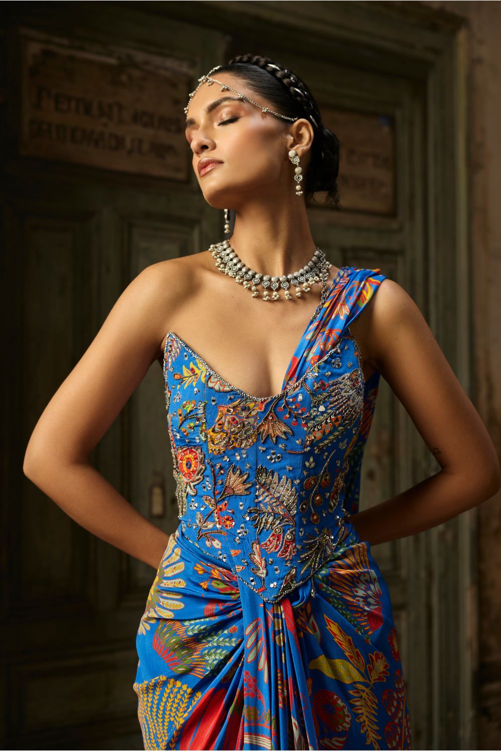 ELECTRIC BLUE PRINTED AND HIGHLIGHTED CORSET DHOTI SKIRT SAREE SET