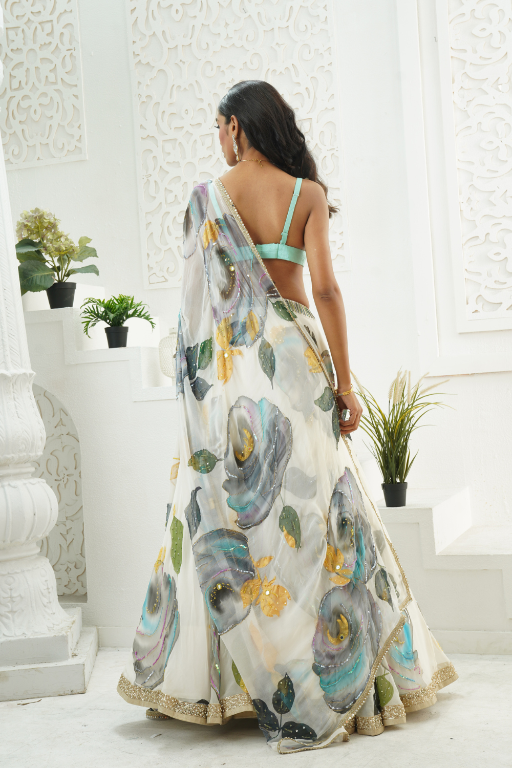 Ivory hand painted lehenga and Mint bralette blouse set