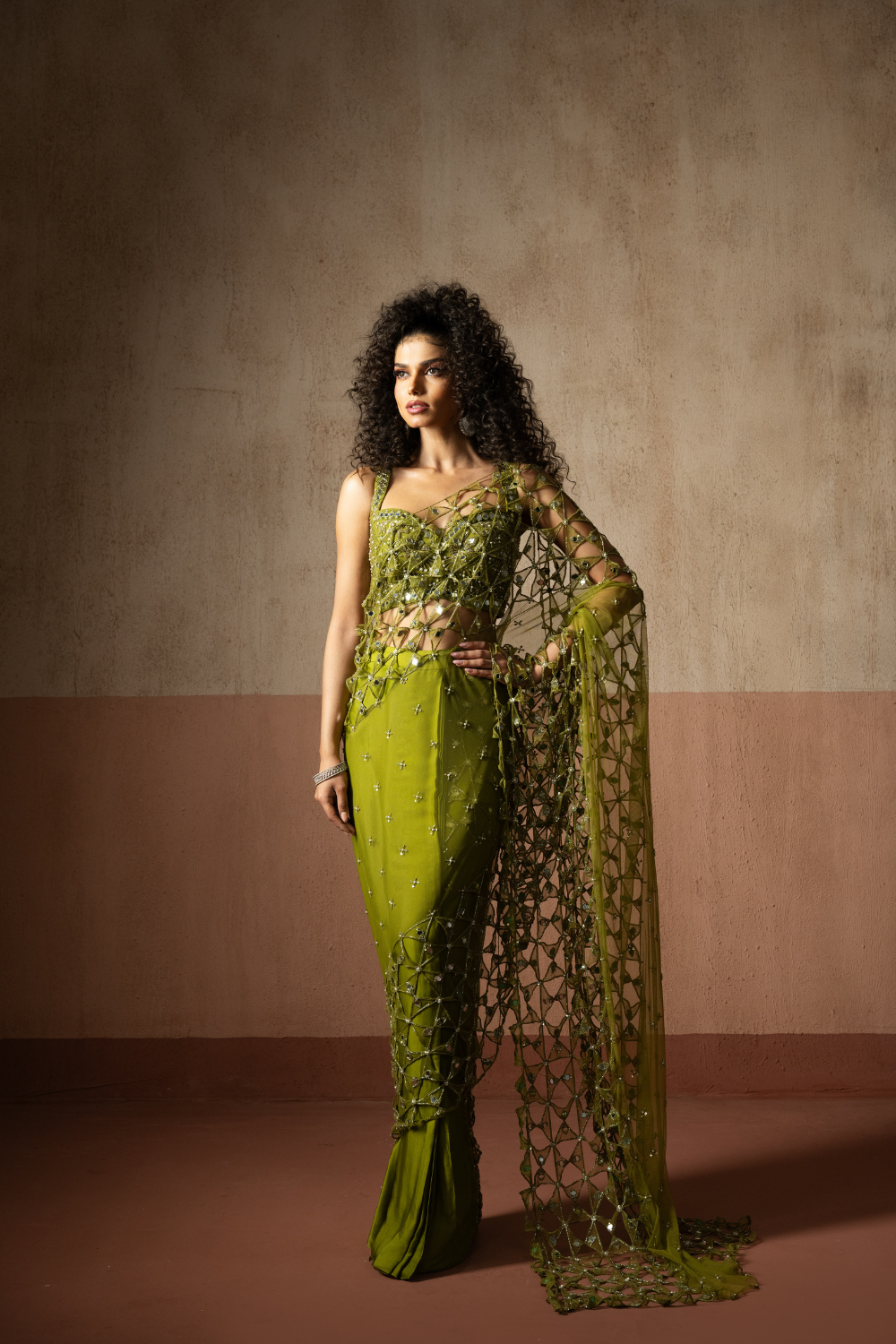 Predraped , mehendi green , hand embroidered net & satin saree