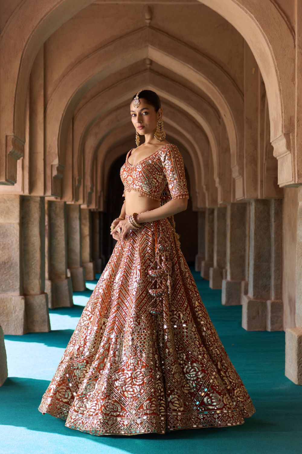 TEJ — Rust Orange Organza Lehenga Set