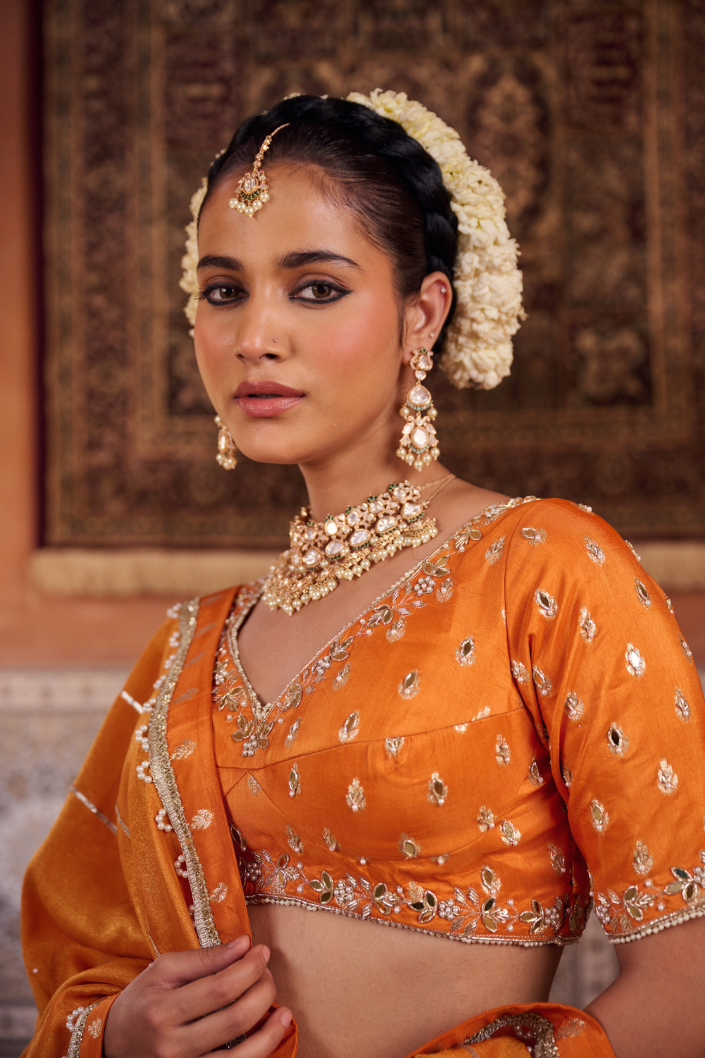 Rust orange silk embroidered blouse, lehenga and dupatta