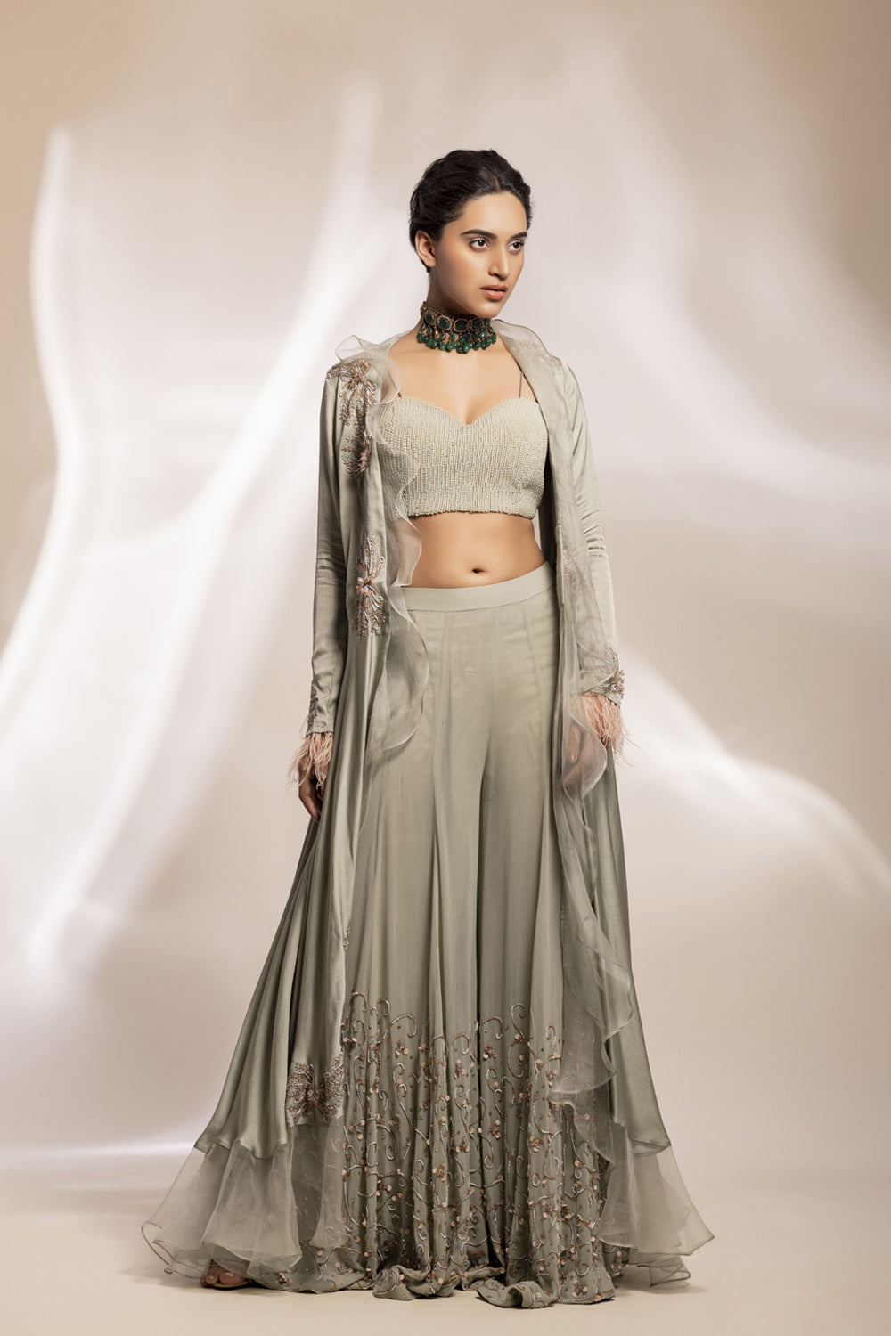 Long assymetrical jacket, inner corset and sharara