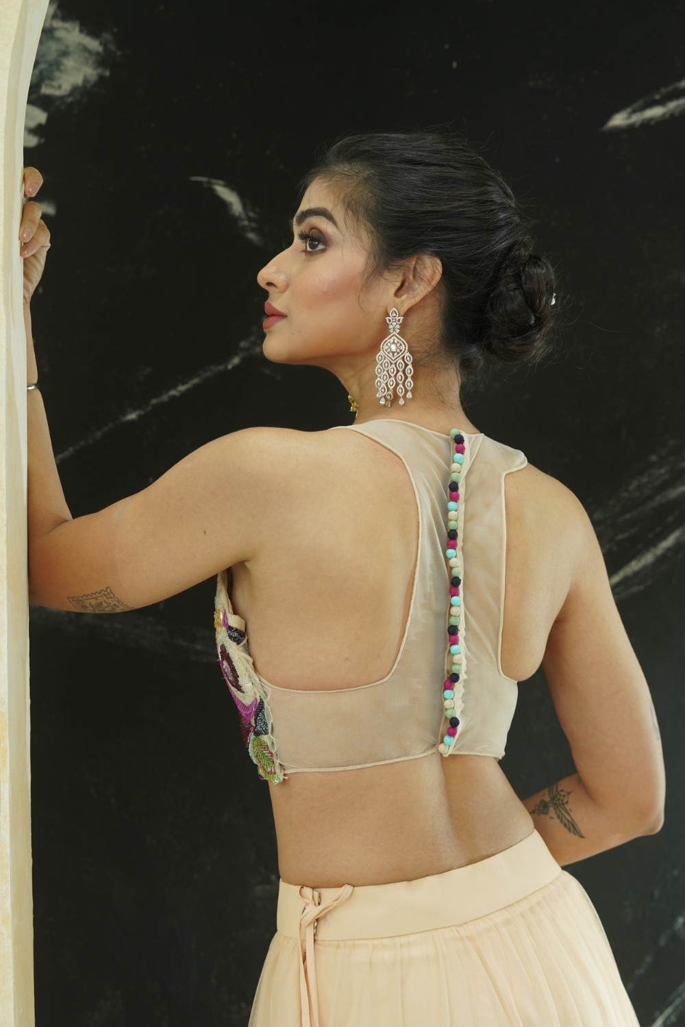 Multi-hued embroidered blouse and tier skirt set