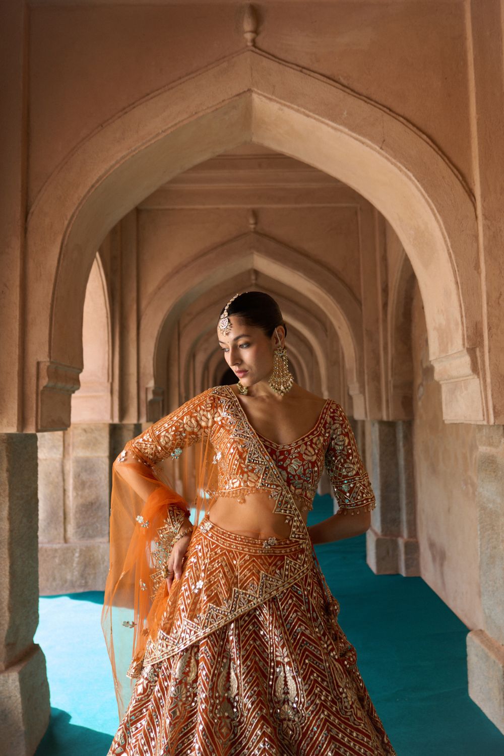 TEJ — Rust Orange Organza Lehenga Set