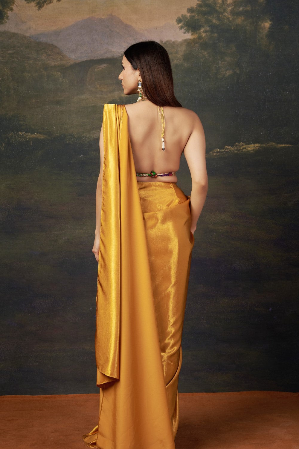 Liquid gold saree with Cleopatra blouse