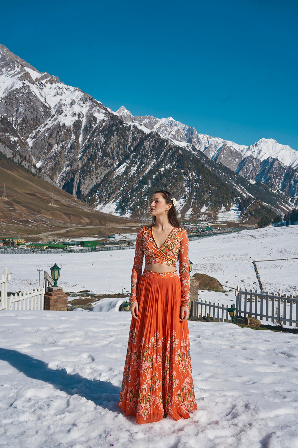 orange floral hand embroidered wrap blouse with pleated lehanga made in georgette fabric