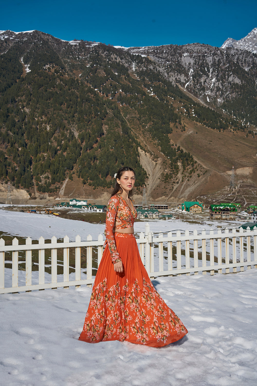 orange floral hand embroidered wrap blouse with pleated lehanga made in georgette fabric