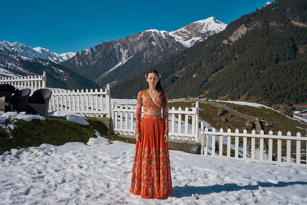orange floral hand embroidered wrap blouse with pleated lehanga made in georgette fabric