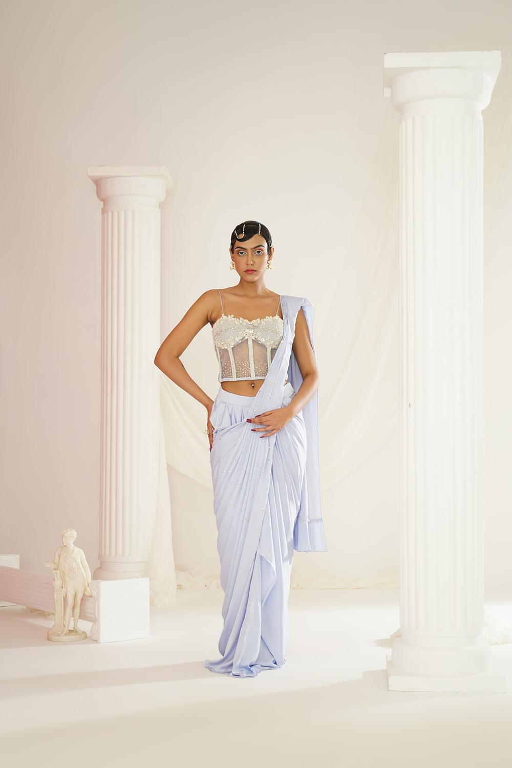 Powder Blue Embroidered Corset Blouse With
Ready To Wear Drape Saree Set
