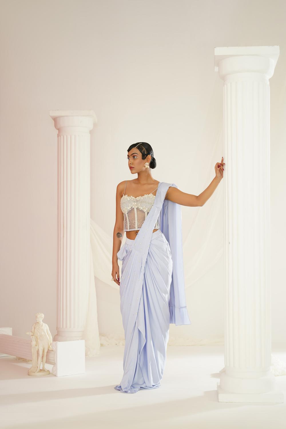 Powder Blue Embroidered Corset Blouse With
Ready To Wear Drape Saree Set