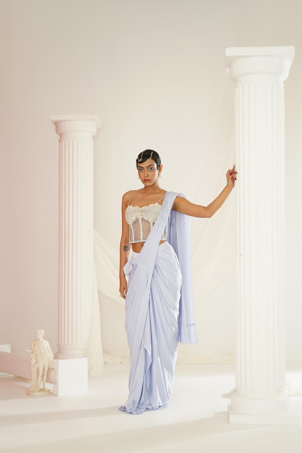 Powder Blue Embroidered Corset Blouse With
Ready To Wear Drape Saree Set