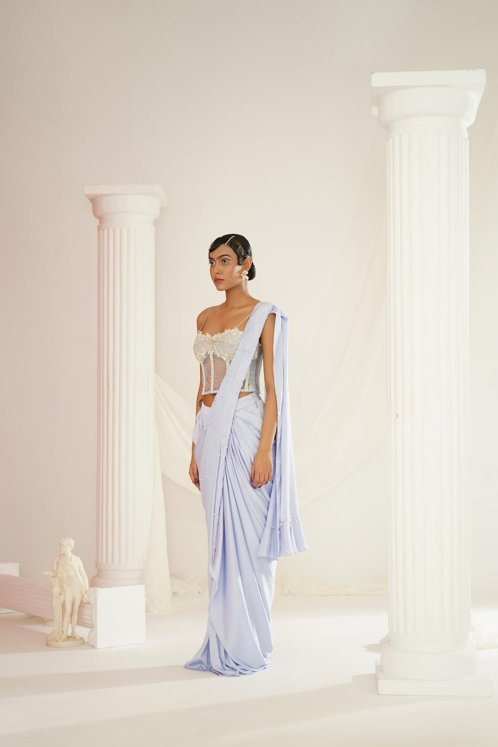 Powder Blue Embroidered Corset Blouse With
Ready To Wear Drape Saree Set