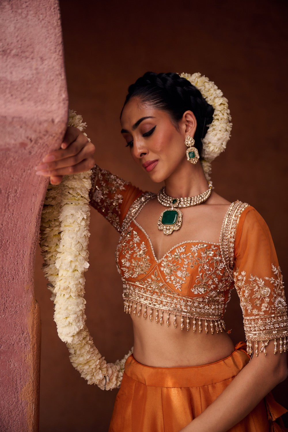 Rust orange embroidered blouse, shimmer tissue lehenga and dupatta
