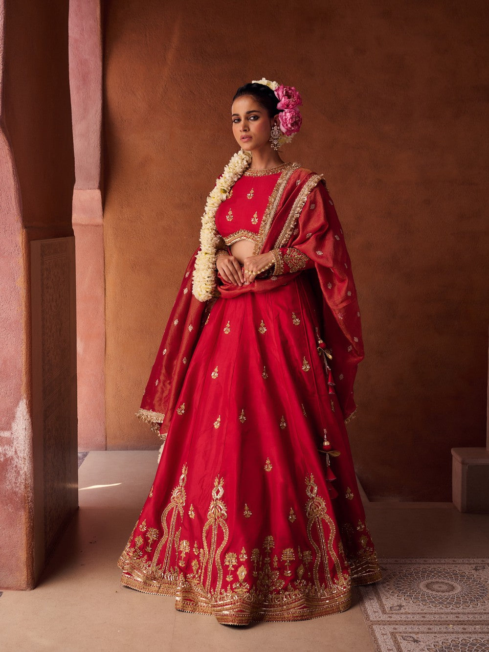 Reddish coral upada silk blouse, lehenga and shimmer tissue dupatta