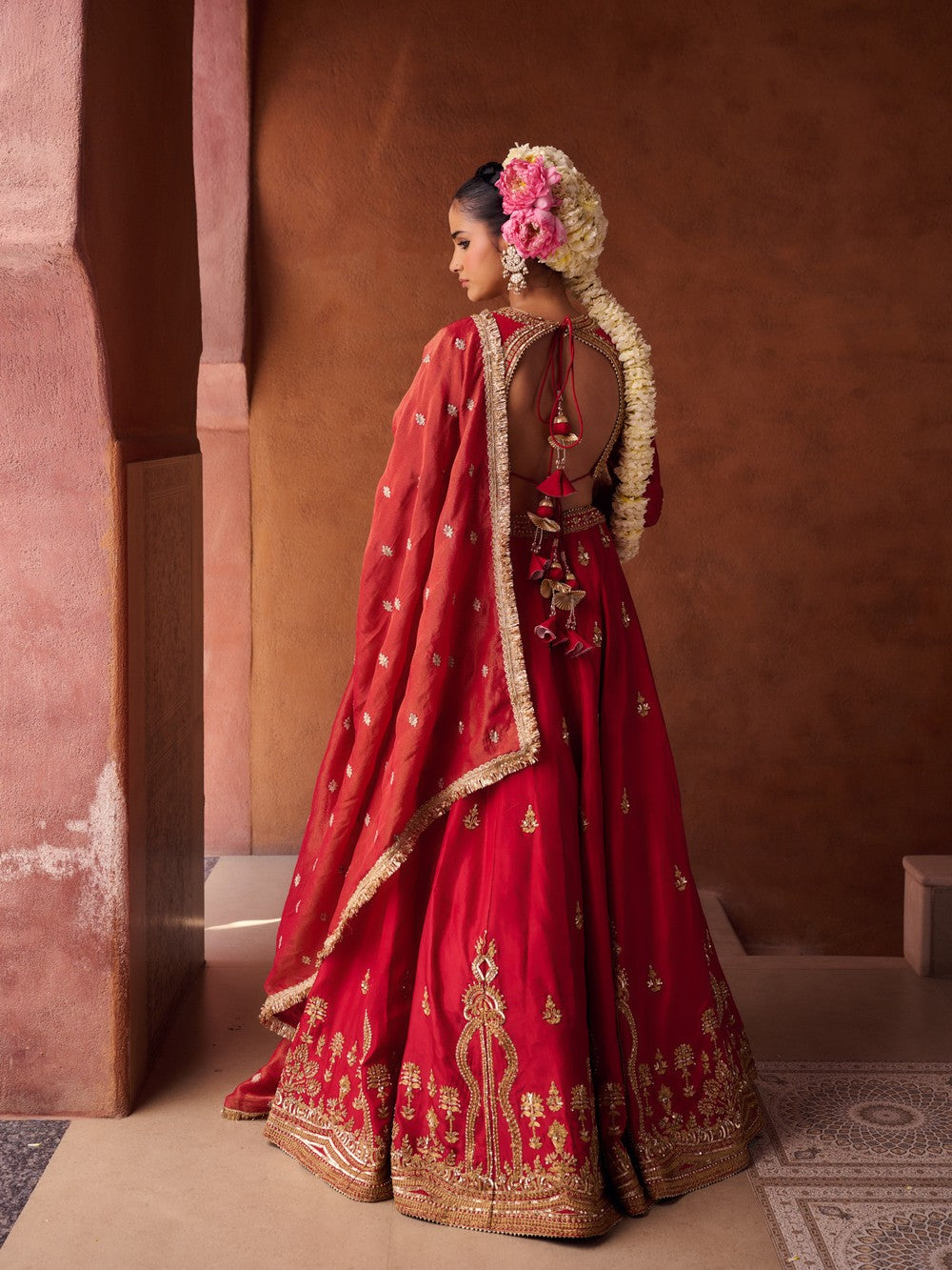 Reddish coral upada silk blouse, lehenga and shimmer tissue dupatta