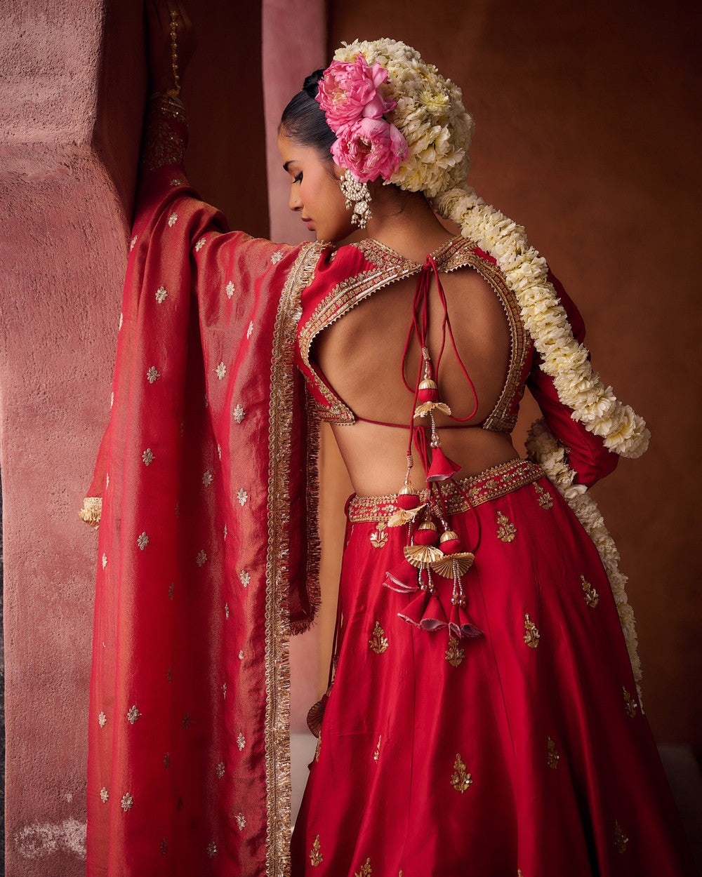 Reddish coral upada silk blouse, lehenga and shimmer tissue dupatta
