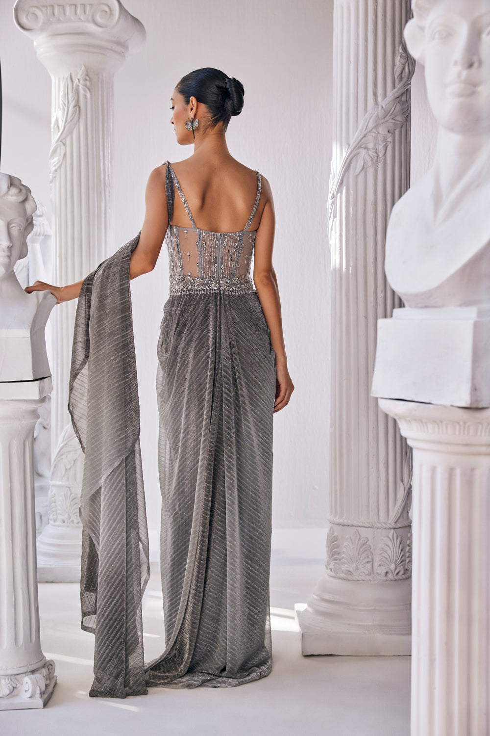 Ombre Draped Saree Gown In A Metallic Crinkle Fabric. It Is Constructed Witha Fitted Corset Bodice In Sequin And Beadwork.
