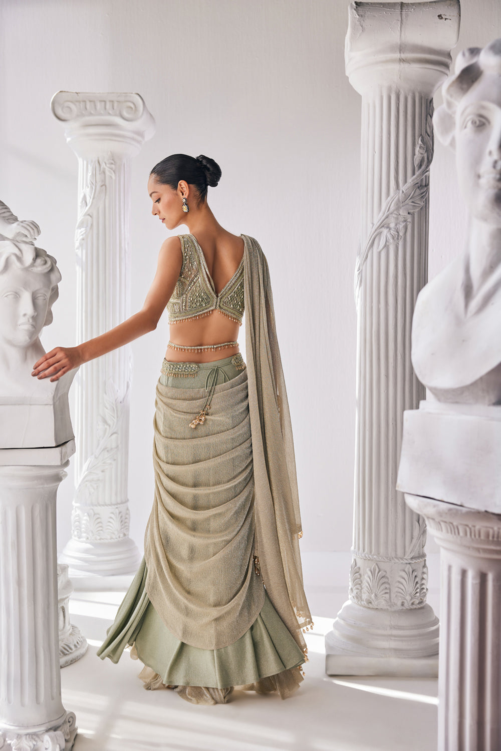 Jade Green Coloured Draped Saree In Lycra And Crinkle Fabric. It Features A Plunging Neck Blouse With Beadwork And Sequin Detailing.