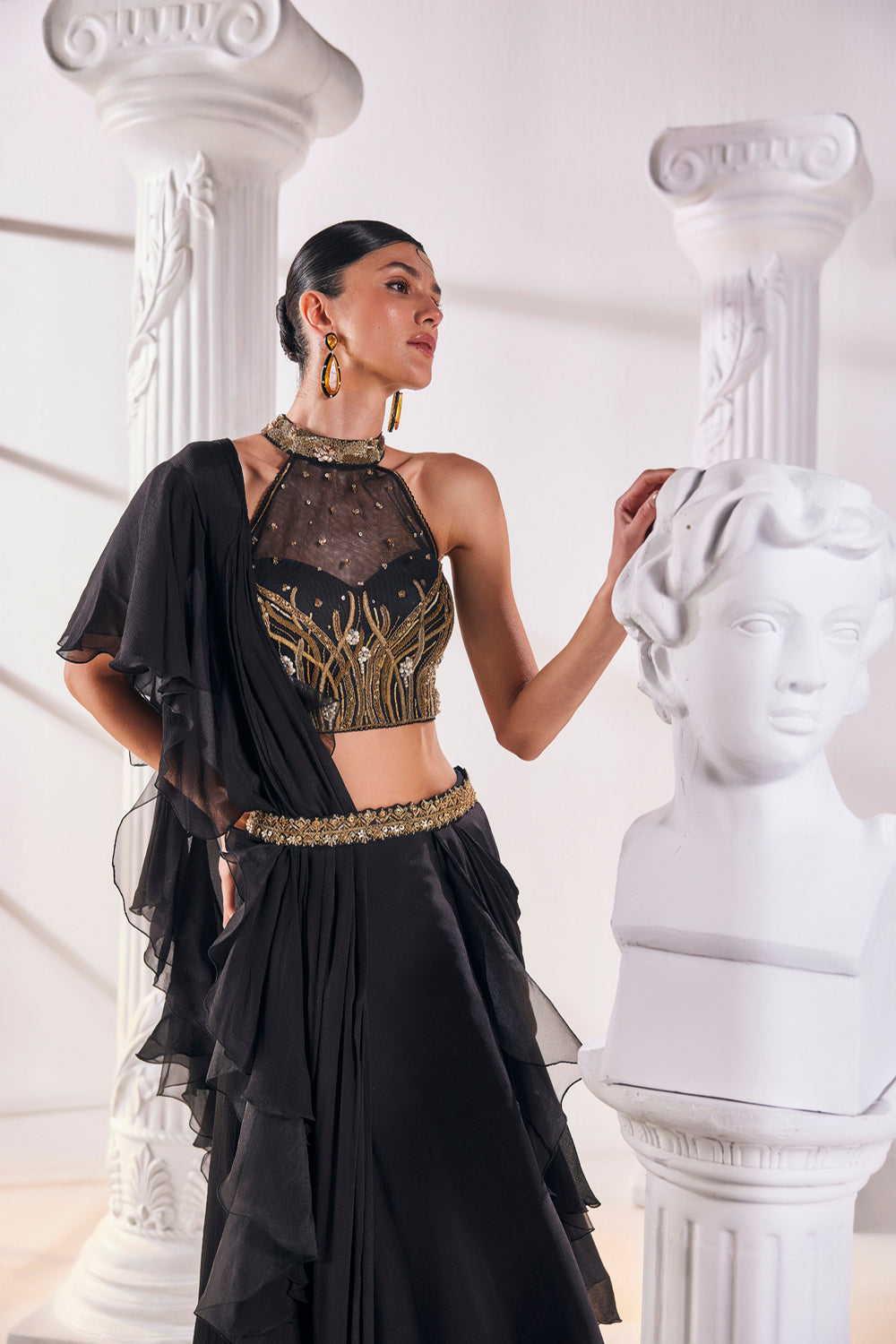 Draped Saree In Chiffon Paired With An Embroidered Organza Blouse And A Belt.