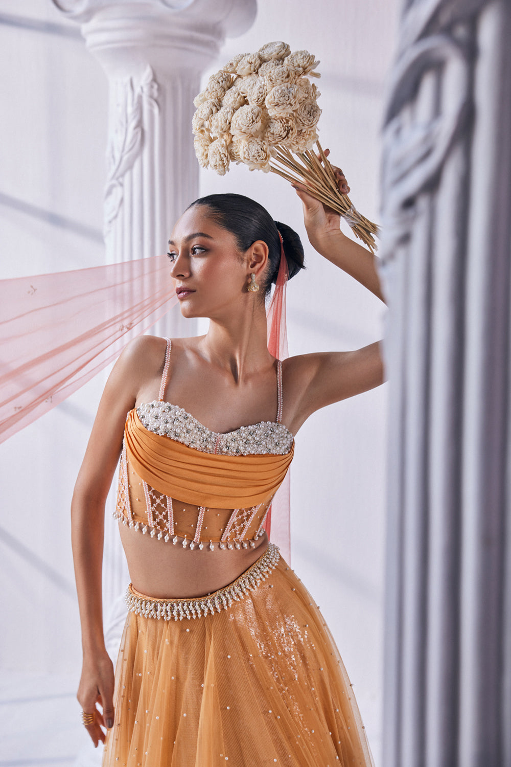 Satin Georgette Ombre Lehenga In Sequin And Pearl Detail. It Is Paired With A Bead Work Corset, Belt And A Dupatta.