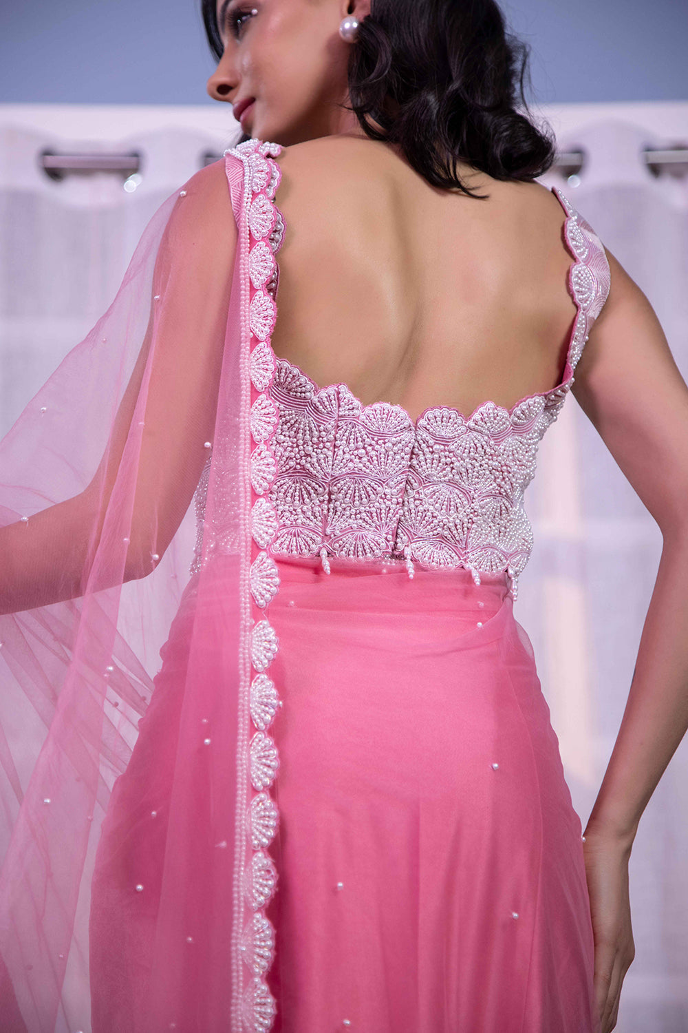 Pink stitched saree pearl