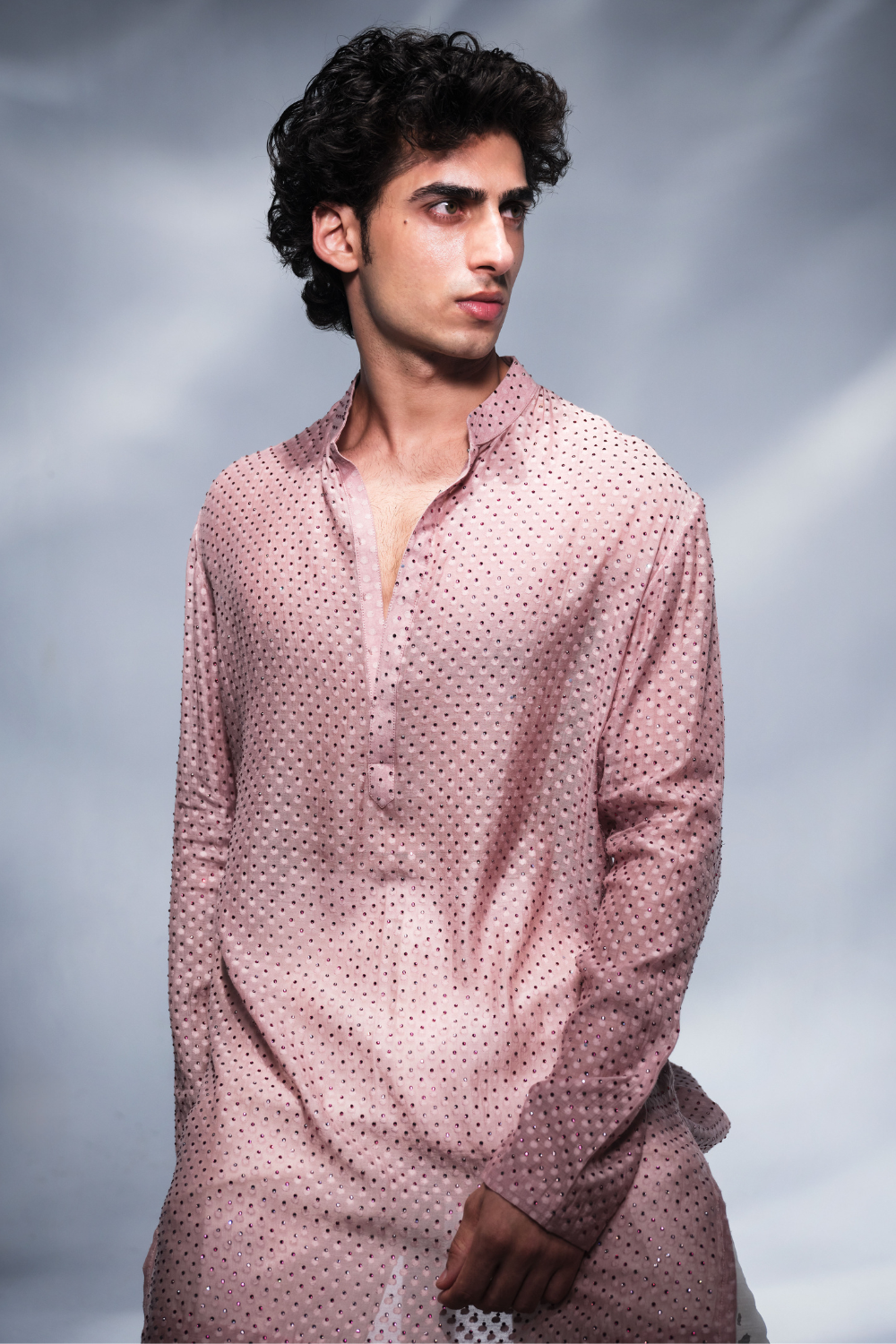 Dusky pink kurta with Swarovski embellishment .
