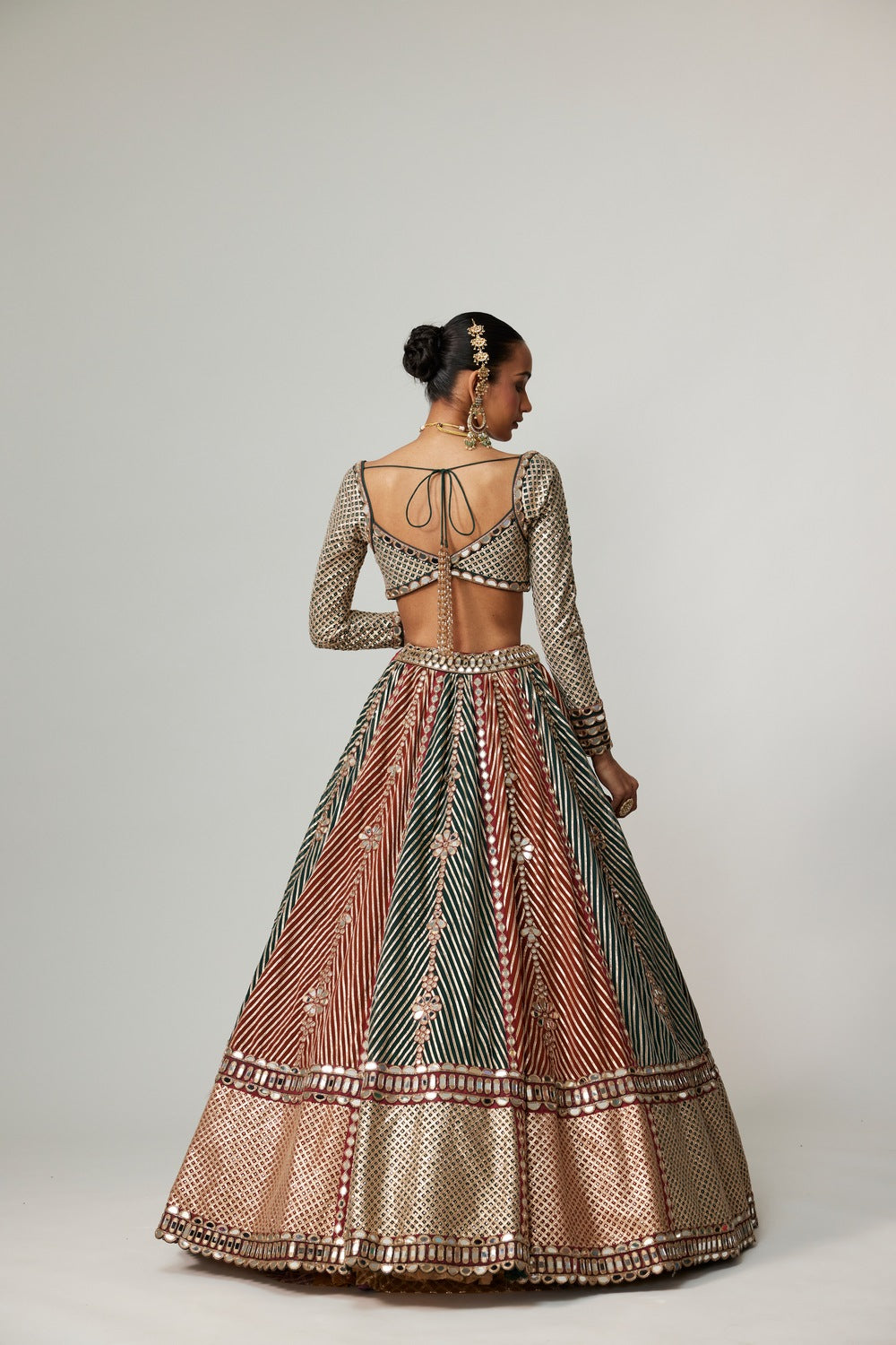 CRANBERRY FLOWER LINEAR LEEHNGA WITH FULL SLEEVE BLOUSE.